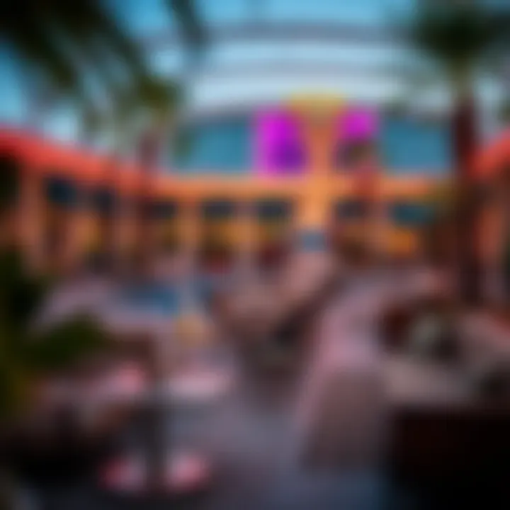 Lounge Comfort at Plaza Vegas A relaxing lounge space by the pool featuring comfortable seating and lush surroundings